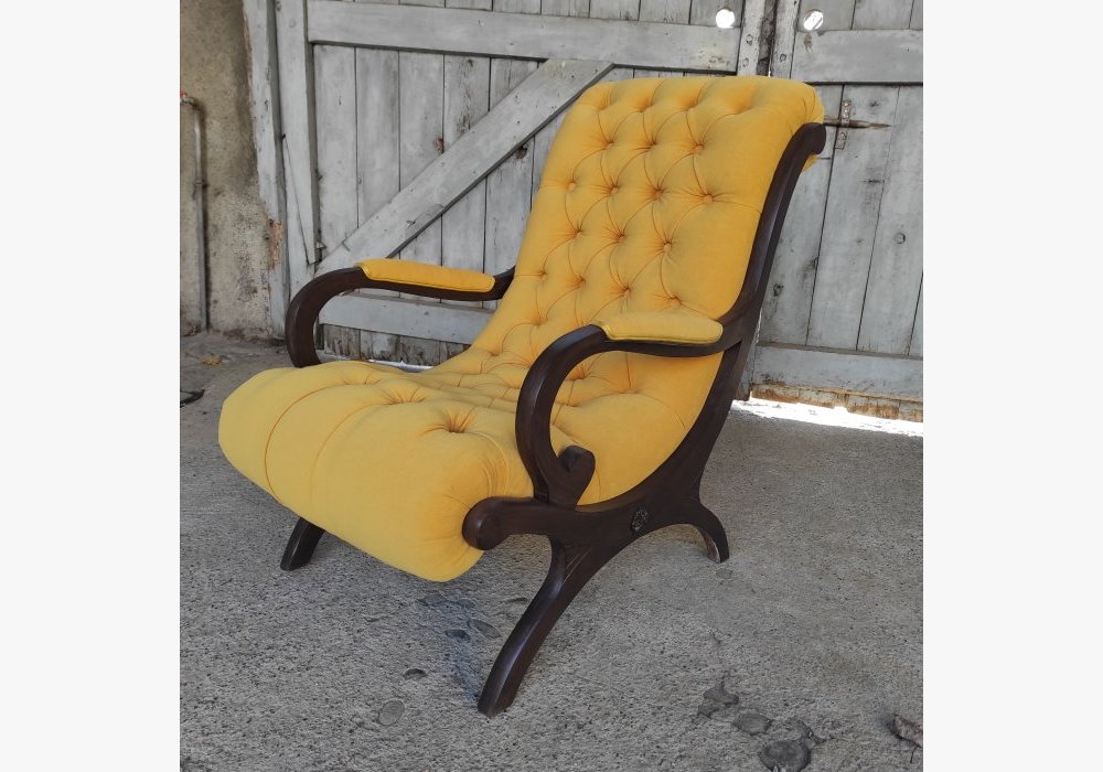 Fauteuil capitonné 